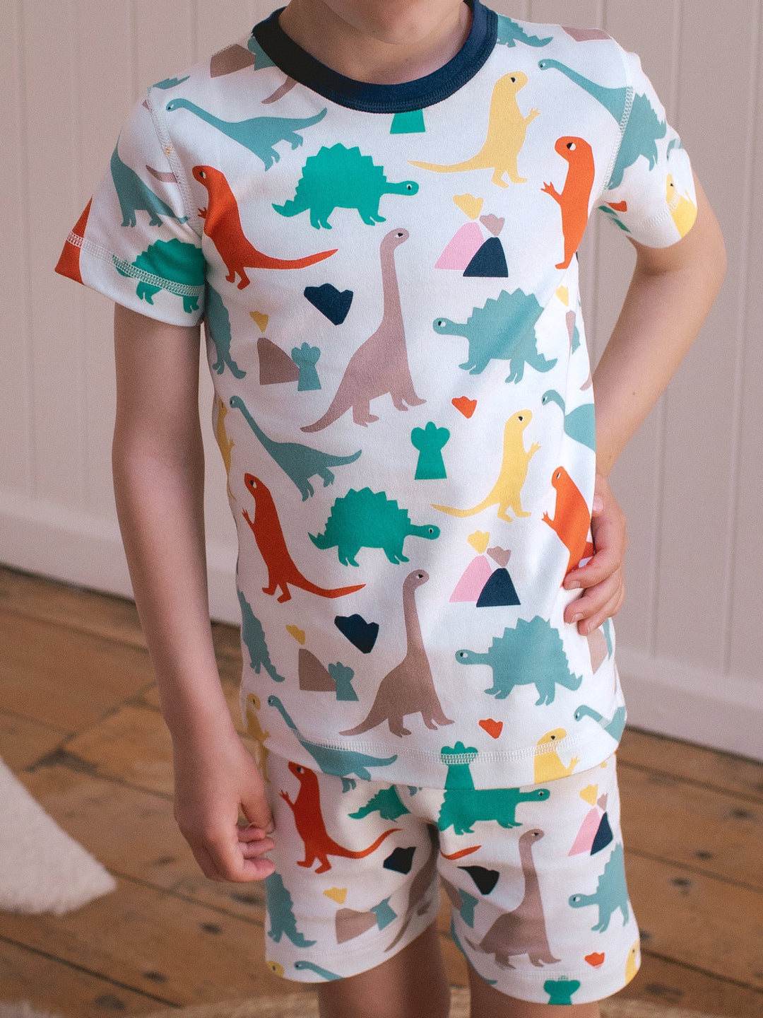 organic cotton kids shortie pyjama PJ front #colour_dinosaurs