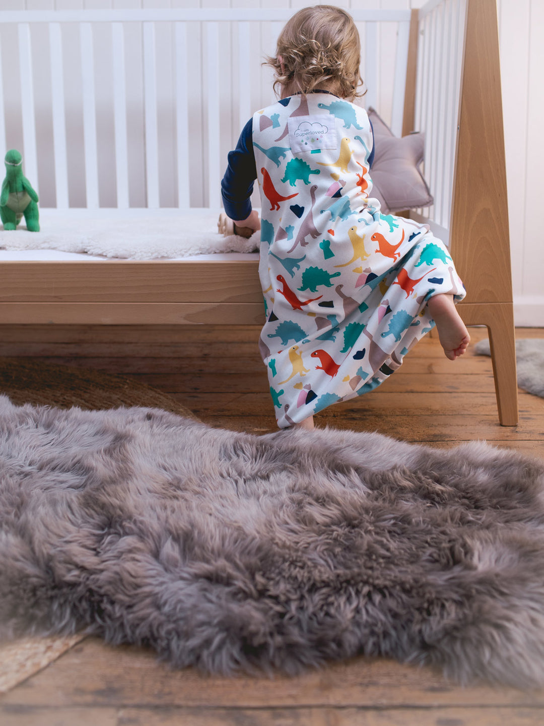 Merino toddler sleeping bag with legs dinosaur print climbing #colour_dinosaurs