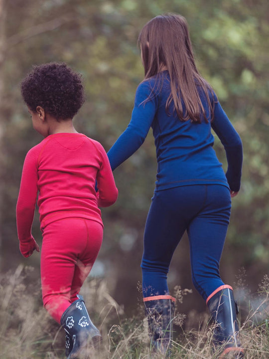 Merino wool kids thermal baselayer pyjama set in navy back #colour_french-navy