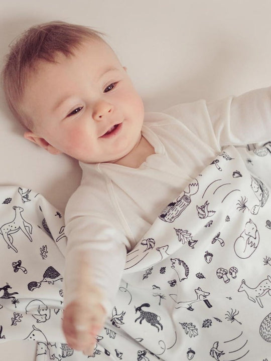 merino baby cot blanket woodland animals front  #colour_enchanted-forest