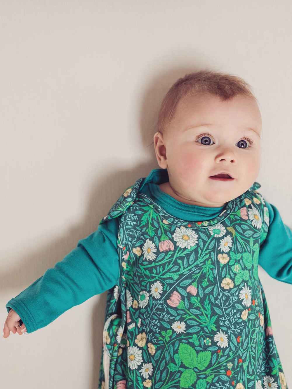 merino baby sleeping bag green floral front detail #colour_secret-garden