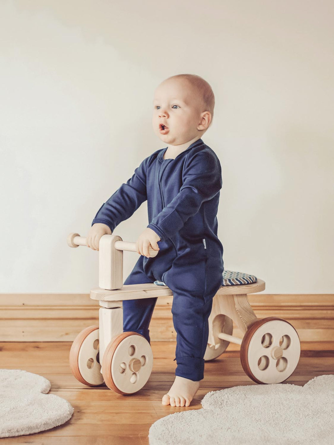 merino baby sleepsuit navy side #colour_french-navy