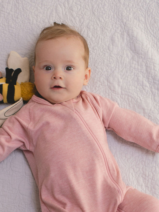 merino baby sleepsuit pink superlove closeup #colour_vintage-rose-melange