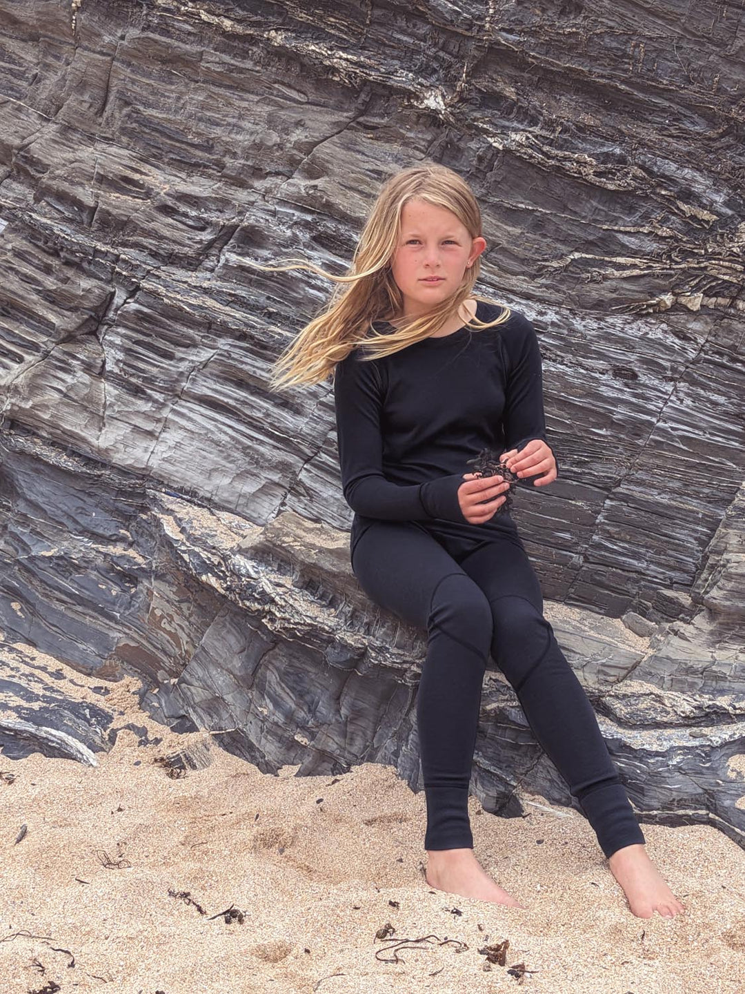 Merino wool kids thermal baselayer pyjama in ink black #colour_ink