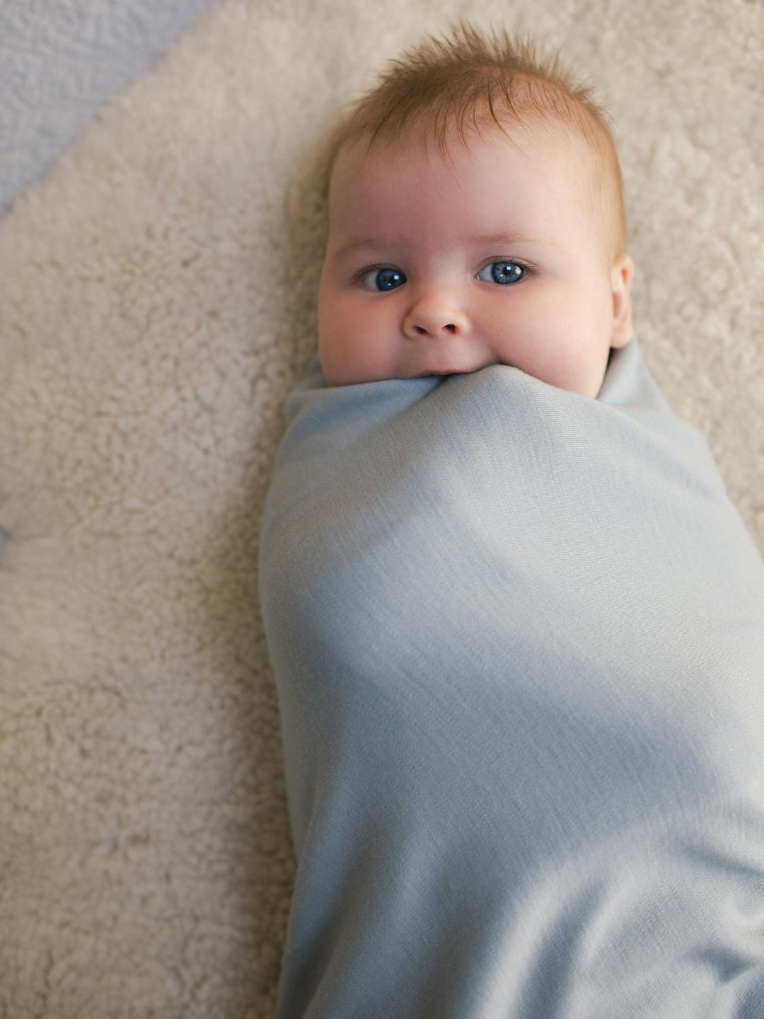 Merino blanket swaddle grey closeup #colour_cloud-grey