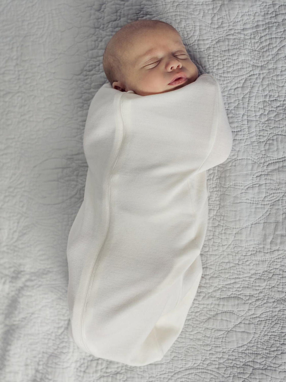 newborn baby merino zip swaddle white front #colour_pure-ivory