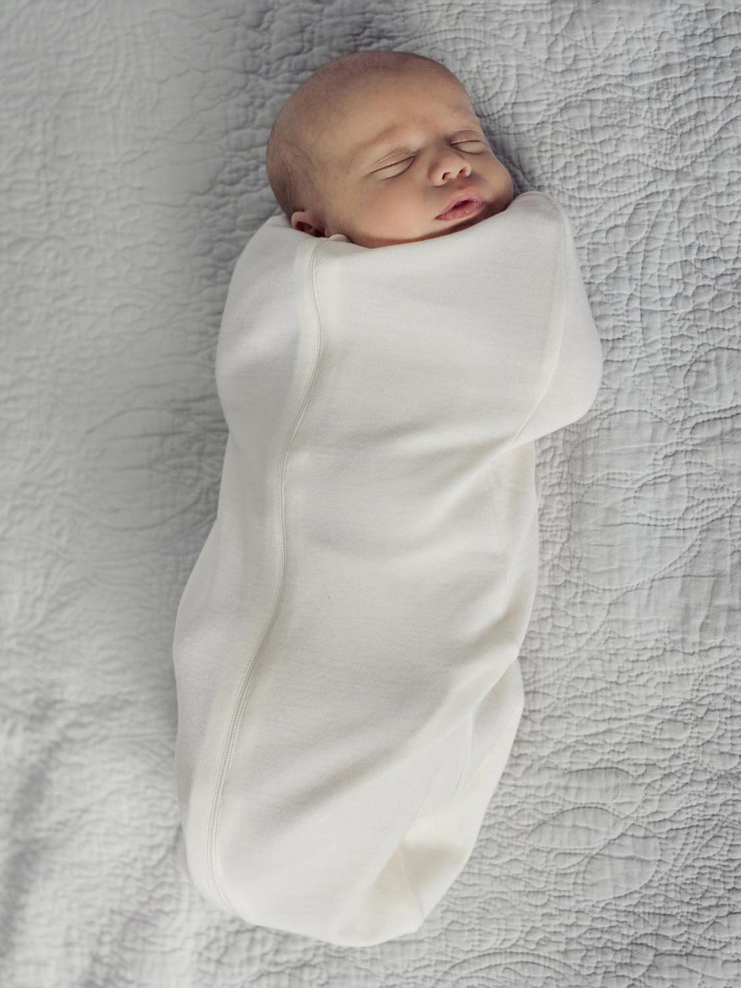 newborn baby merino zip swaddle white front #colour_pure-ivory