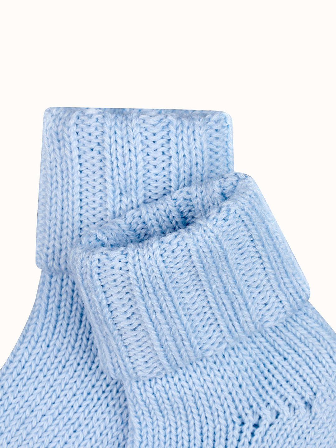Baby Merino wool sock booties closeup by falke #colour_crystal-blue