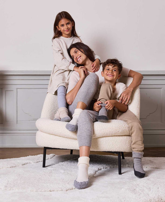 Merino wool toddler and kids felted slipper socks grey lifestyle #colour_light-grey