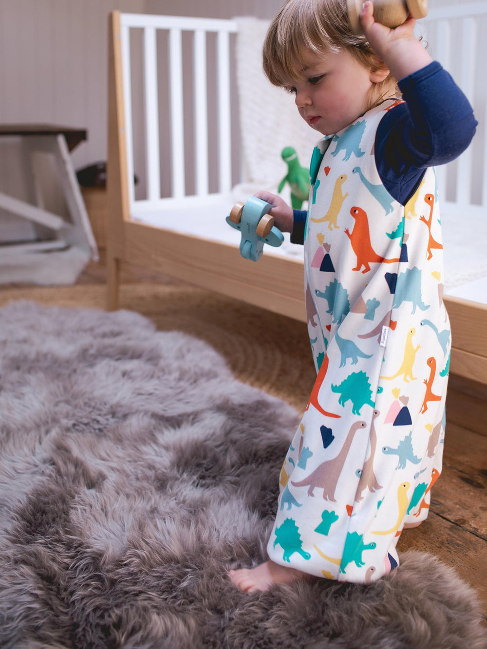 Merino toddler sleeping bag with feet dinosaur print side #colour_dinosaurs