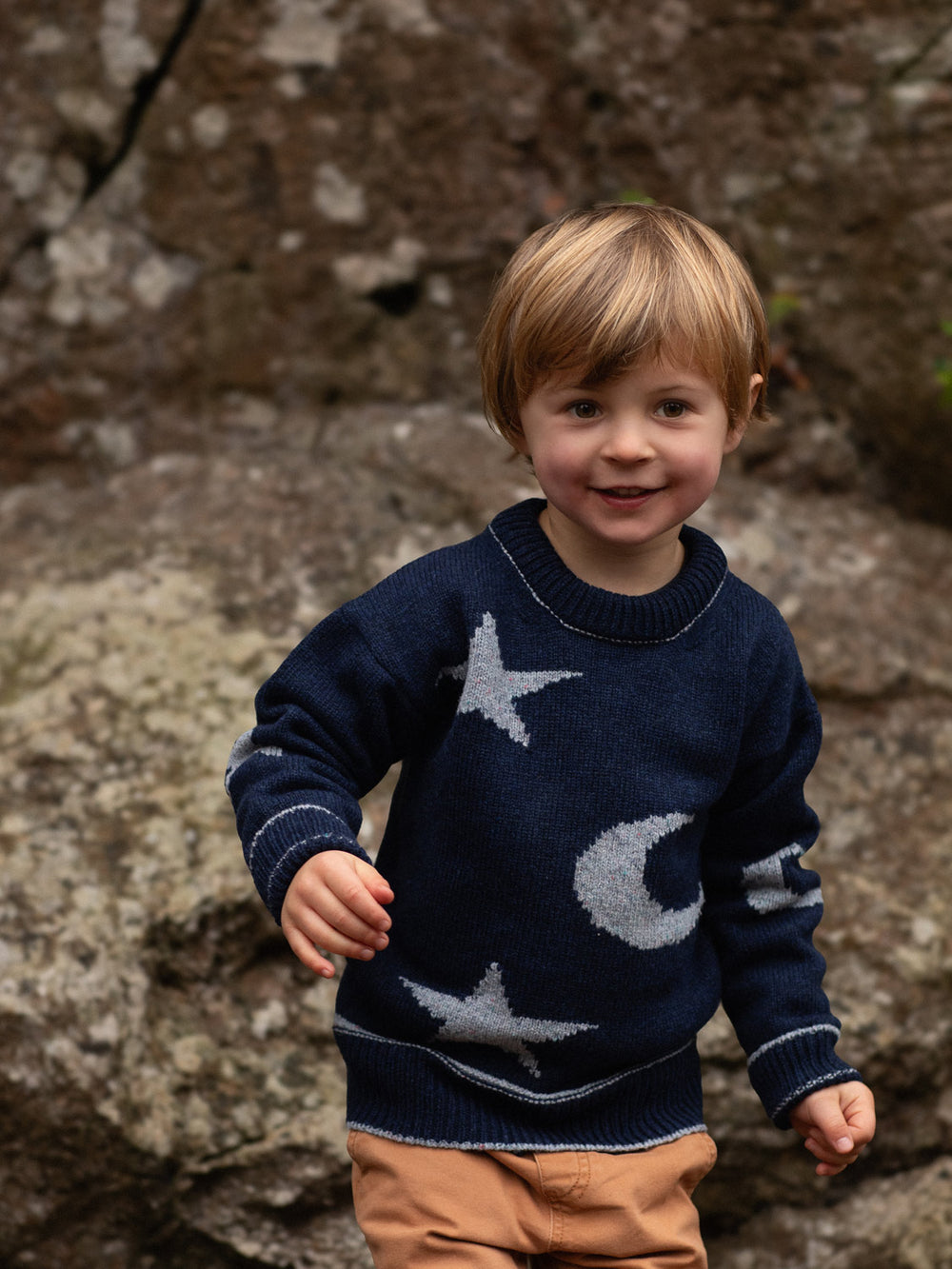 Navy blue merino wool toddler knit sweater with star and moon design front #colour_nocturne