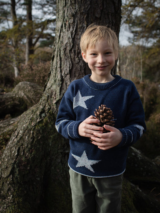 Navy blue merino wool kids knitted sweater gift hand knitted with star and moon design luxury soft #colour_nocturne
