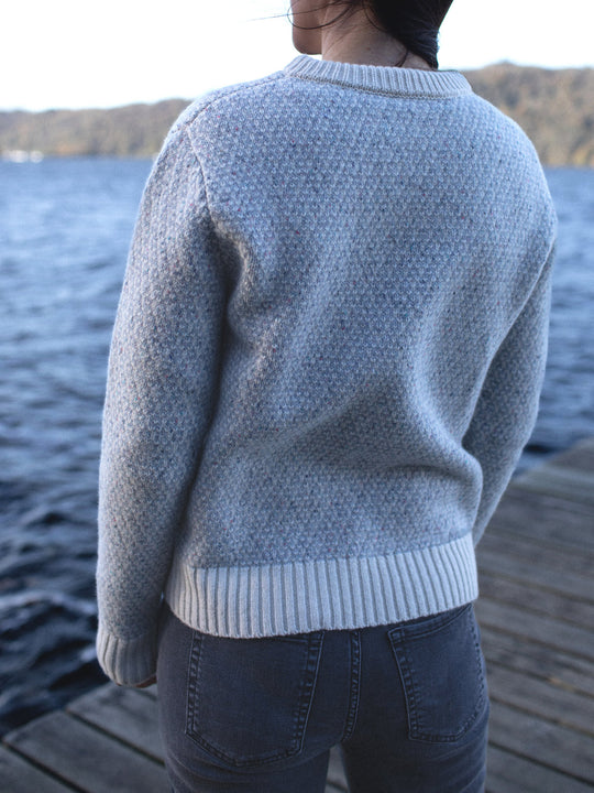 Merino wool womens crew neck jumper sweater knit in neutral grey and white ivory winter icelandic knit rear view #colour_glacial-quartz