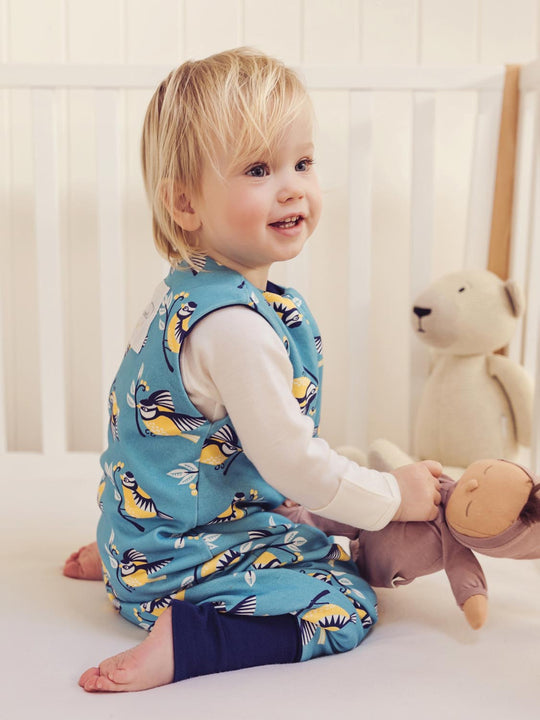 Merino toddler sleeping bag with feet bird print sitting #colour_blue-tit