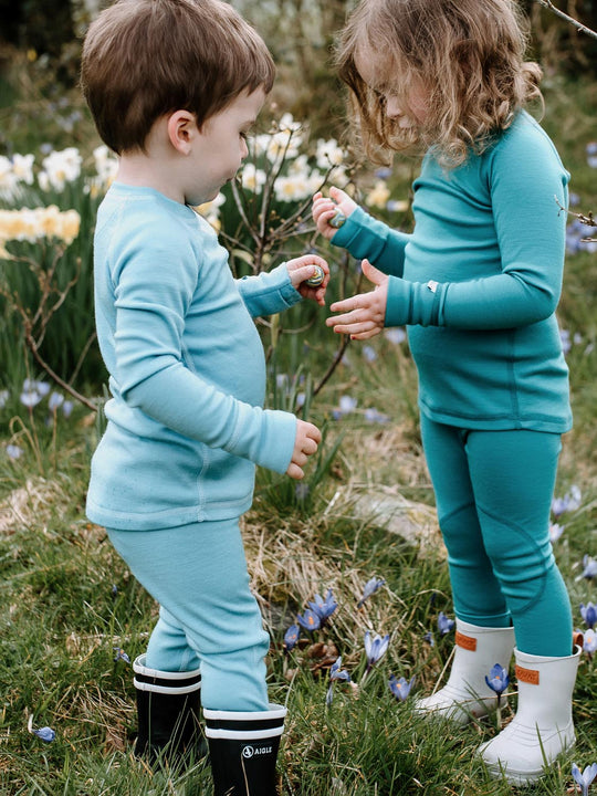 Merino wool kids thermal baselayer pyjama set in blue & green #colour_raindrop