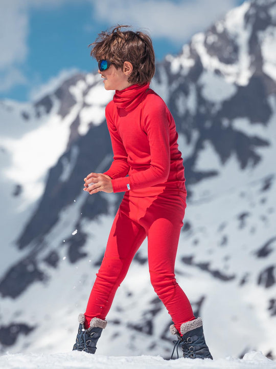 Merino wool kids thermal ski baselayer in red #colour_soft-red