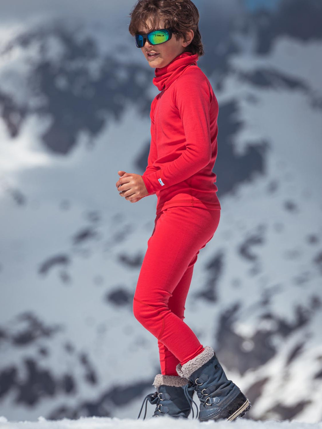 Merino wool kids thermal ski baselayer in red side #colour_soft-red