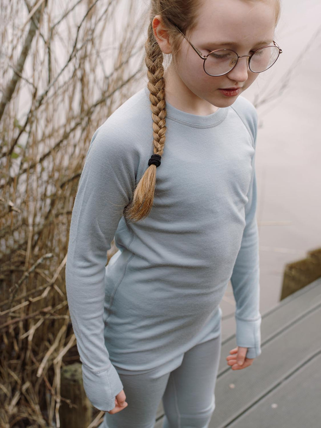 Merino wool kids thermal baselayer pyjama top in grey #colour_cloud-grey