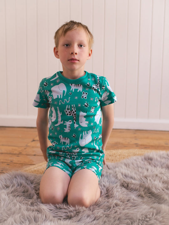 organic cotton kids shortie pyjama PJ sitting #colour_on-safari