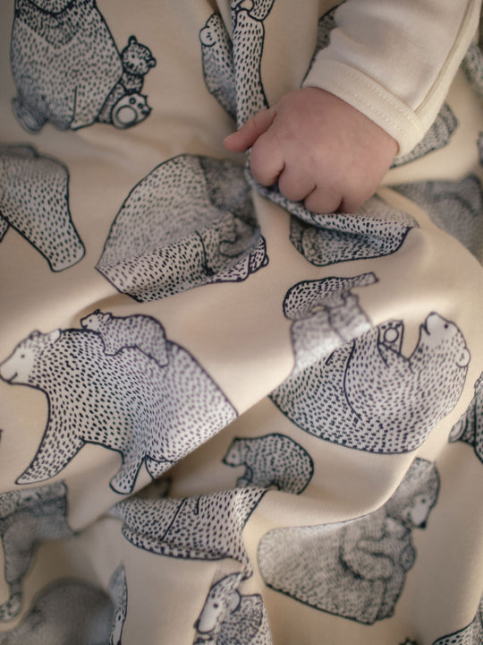 Merino baby sleeping bag neutral beige bear closeup #colour_bearhugs-oat