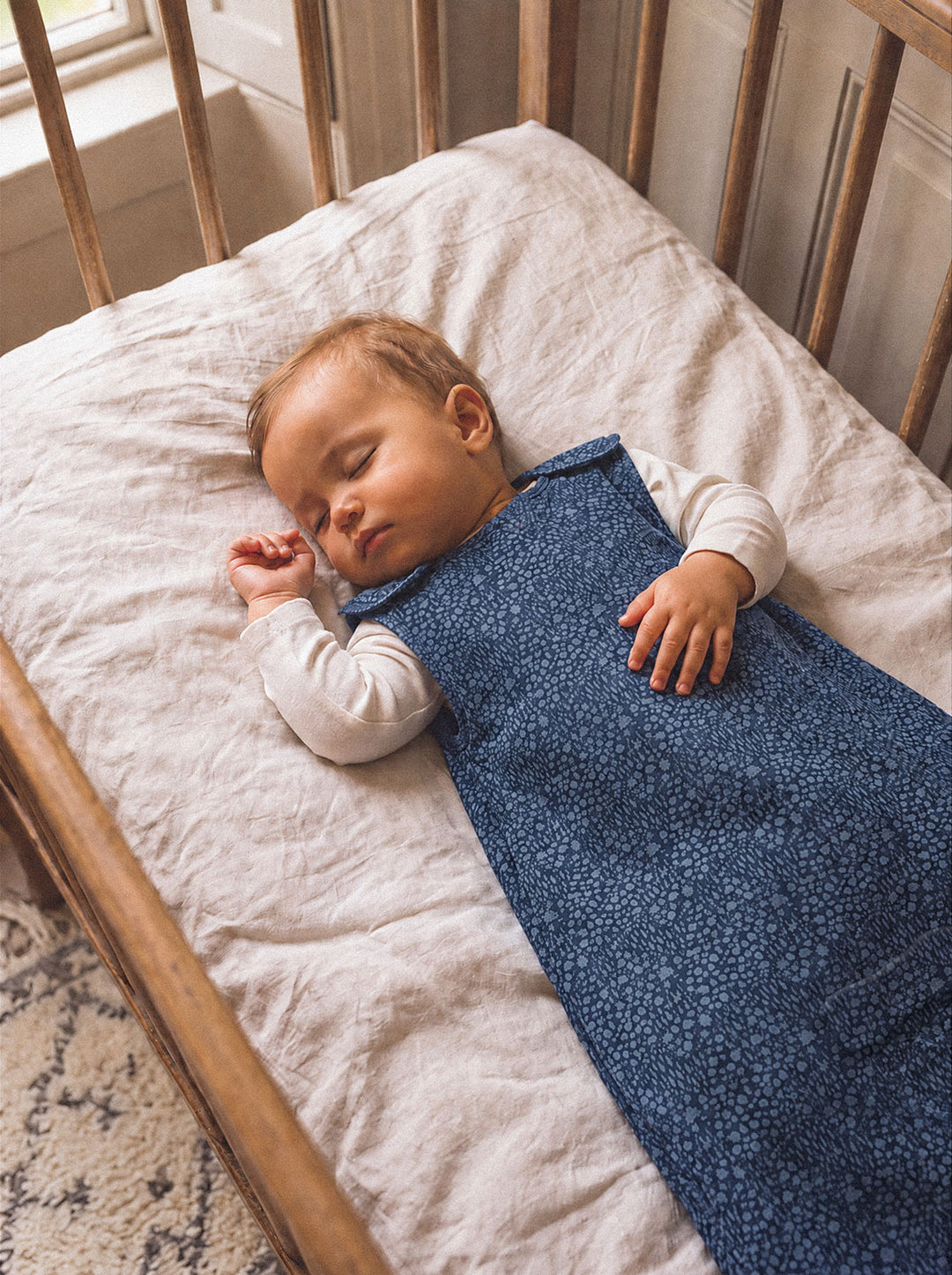 Merino baby sleeping bag neutral forest woodland print front Navy #colour_sylvan-navy