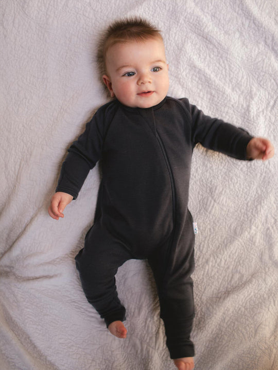 merino baby sleepsuit black front #colour_ink