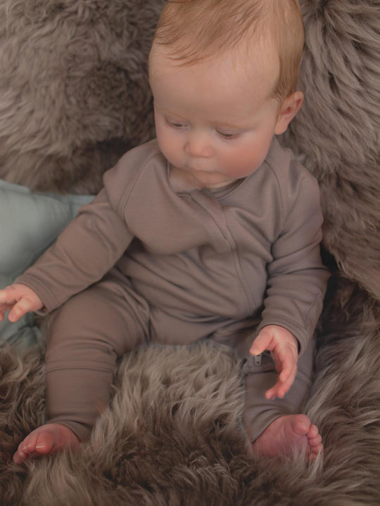 merino baby zip sleepsuit beige neutral unisex detail #colour_pebble