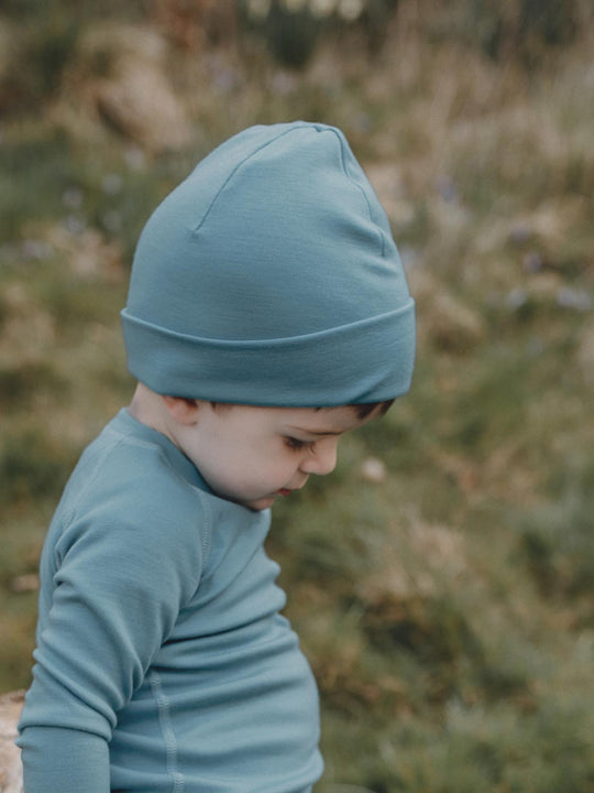 Merino beanie hat blue kids side #colour_lake