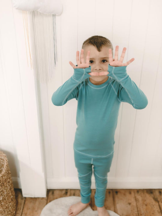 merino kids thermal base layer blue front #colour_raindrop