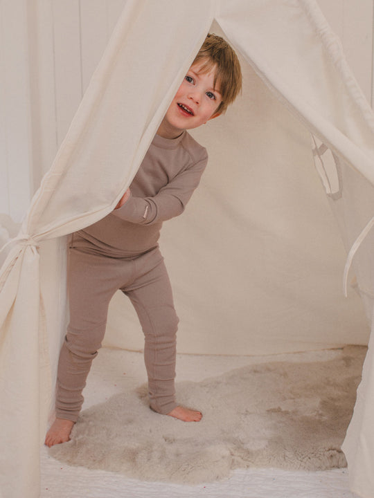 Kids merino base layer thermal legging beige neutral front #colour_pebble