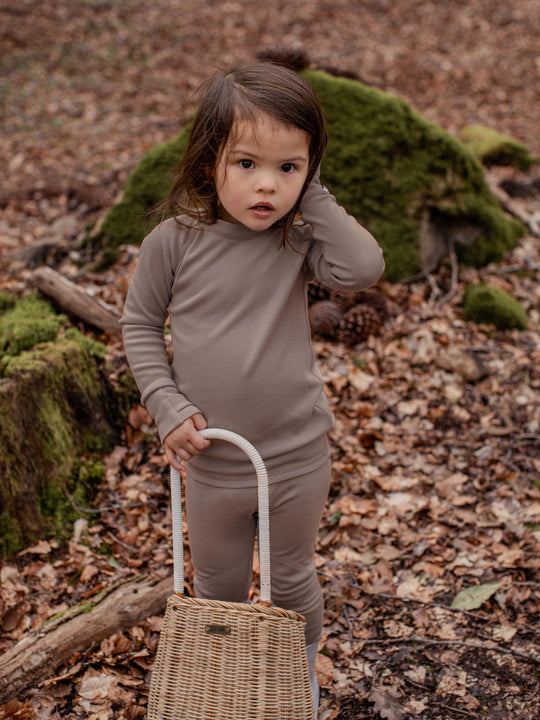 Merino wool kids thermal baselayer pyjama in neutral beige outdoor #colour_pebble