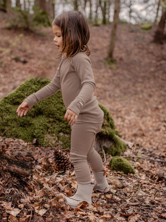 Merino wool kids thermal baselayer pyjama in neutral beige side #colour_pebble