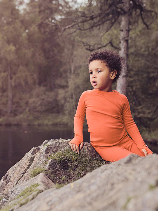 Merino kids thermal baselayer top orange front #colour_fox