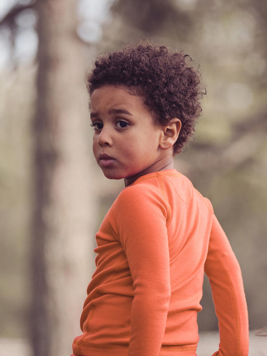 Merino kids thermal baselayer top orange back #colour_fox