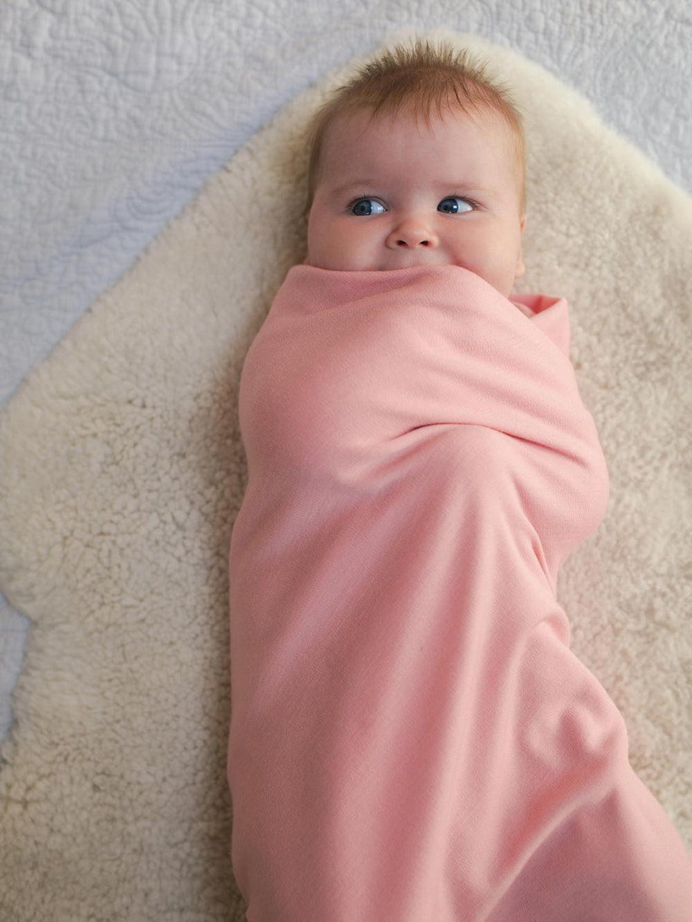 Merino blanket swaddle pink front #colour_vintage-rose