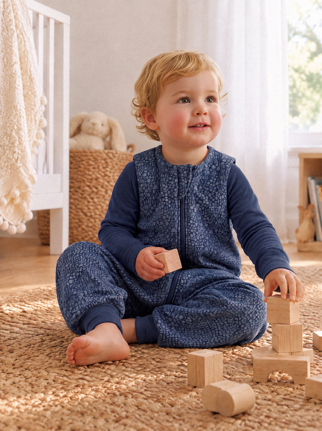 Merino toddler sleeping bag with feet neutral tree forest print sitting navy #colour_sylvan-navy