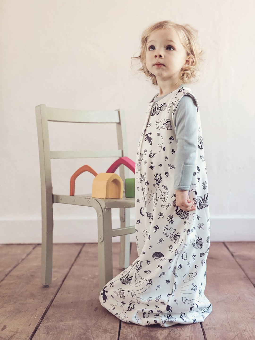 Merino toddler sleeping bag with feet animals side view #colour_enchanted-forest