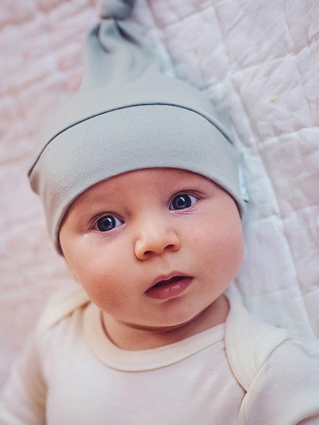Merino baby hat grey front #colour_cloud-grey