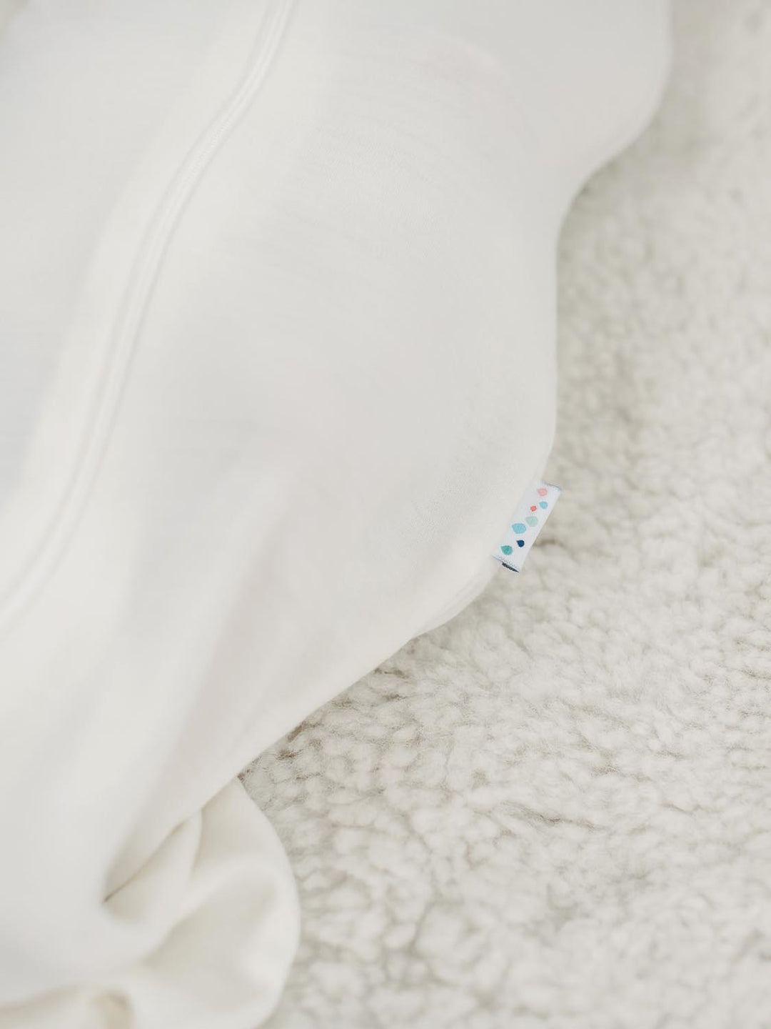 newborn baby merino zip swaddle white detail #colour_pure-ivory
