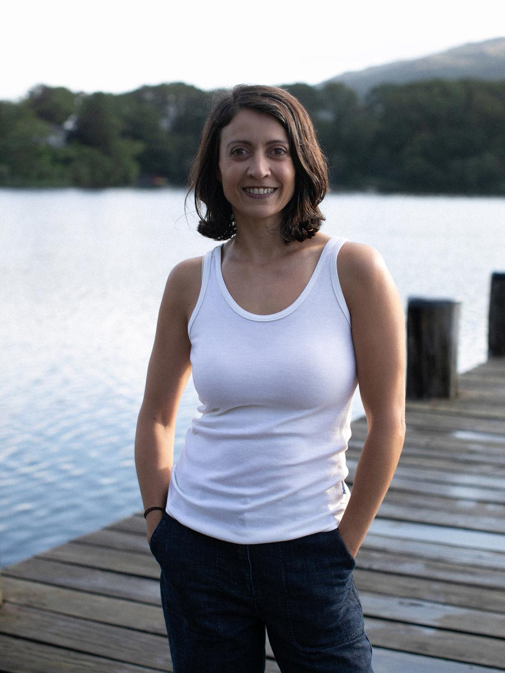 Womens merino tank top ivory front 
#colour_pure-ivory