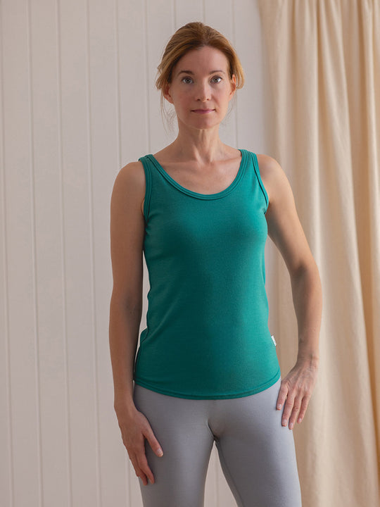 Merino womens baselayer thermal vest green front #colour_wild-green